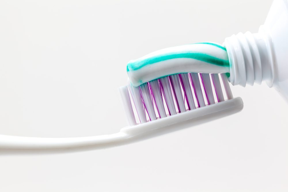 Fluoride is in toothpaste.  The government is not trying to control you or make you dumber.  Or dumber that is.