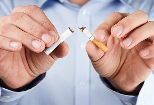Cut the smokes to naturally lower your blood pressure.