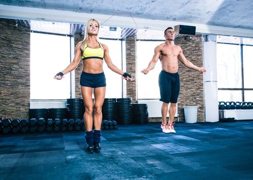 Man and Woman jumping rope. 