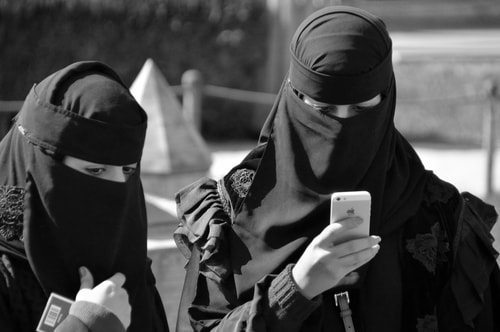 10 Mysteries About the 9/11 Terror Attack 2 muslim women receiving text from Osama Bin Laden prior to 9/11 terror attacks. top 10 mysteries about the 9/11 terror attacks